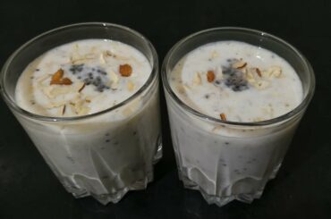 Banana smoothie with dry fruits and basil seeds healthy breakfast option.