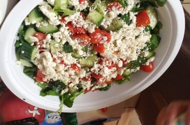 Making good yummy food salad with the sister