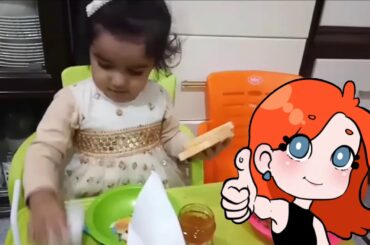 baby funny talking with her mom about her cousin during breakfast with jam