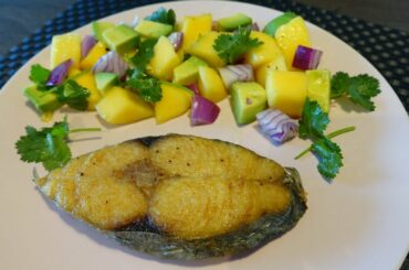 Healthy dinner Mackerel Steak (kingfish) with mango salad
