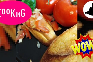 Cooking: Bruschetta, healthy snack from Italia, delicious dish with tomatoes