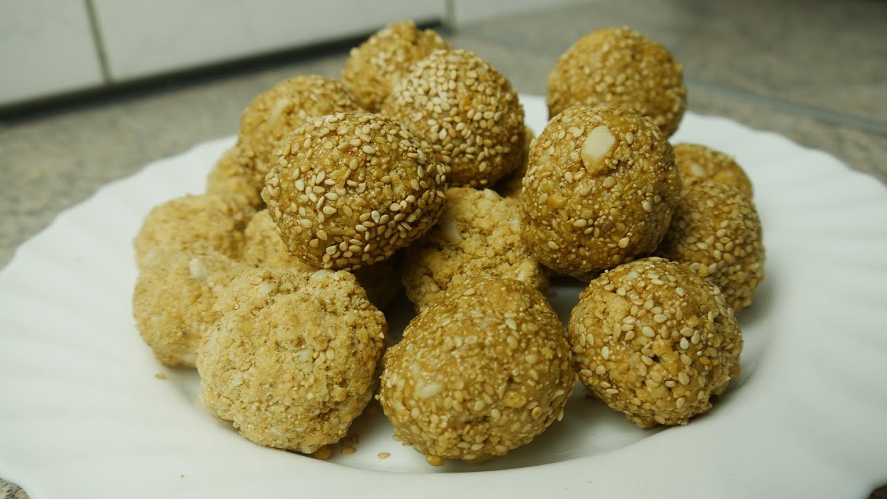 Til Gud Pinniyan/Ladoo – Lohri Special Recipe – Super delicious and healthy Recipe Til Gud Pinniyan/Ladoo - Lohri Special Recipe - Super delicious and healthy Recipe