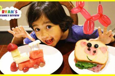Ryan makes fun food for kids with animal shaped sandwich and fruit train!