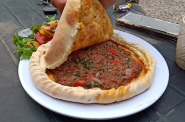 center fill bread beef mince and vegetables in oven - chap shoro - inside fill