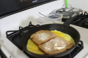 Egg and Cheese sandwich in a pan. Its quick and healthy. I'm using 100% whole wheat bread