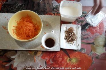 Tasty and healthy food. Carrots with honey and nuts