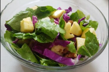 Vegetables salad with walnut, apple and raisin - healthy recipe