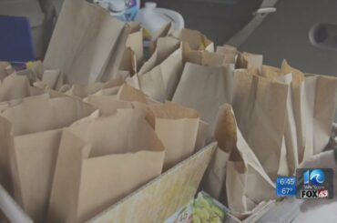 2 Norfolk women help pack lunches for families in need