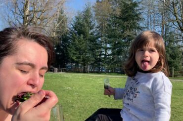 Liana at the picnic eating salad
