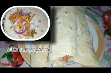 Homemade pita bread sandwich with chicken breast filling and vegetables | lockdown recipe