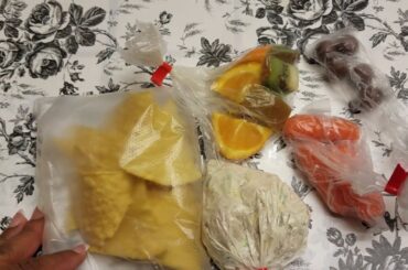 Lunch Ideas 56 Turkey salad with tortilla nacho chips, carrots, kiwi, oranges, whopper candy