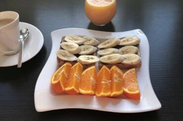 Healthy breakfast toast bread Nutella with banana