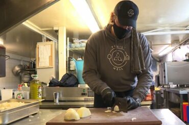 London charity dishes up free meals for medical staff and essential workers | AFP