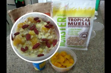 HEALTHY MUESLI BREAKFAST WITH FRESH MANGOES