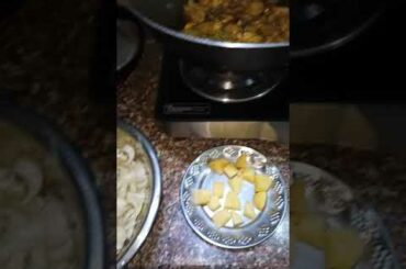 Cooking chicken with small banana healthy food of Assam