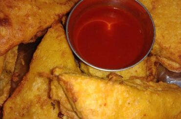 Bread pakora recipe at home using simple ingredients .Besan bread pakora.