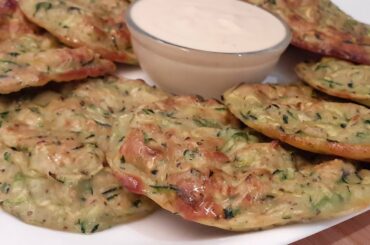 Grated Zucchini in delicious easy and healthy recipe/Courgettes fritters/zucchini pancakes