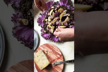 Healthy salad with purple kale, beets, apples, blue cheese and lentils. Nutritious and delicious!