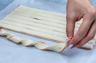 A healthy dessert made of pastry dough from the store and jam. My kids adore them!