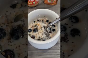 Healthy Breakfast Recipe Peanut Butter and Blueberry Porridge with Chia Seed Topping and Runny Honey
