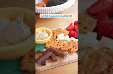 Fill a board with healthy, colorful snacks to keep your kids busy and happy!