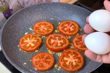 This is just a great breakfast - fried eggs with TOMATOES, CHEESE and GARLIC