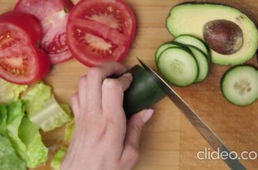 slicing #vegetables on a board to prepare a healthy salad
