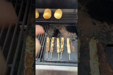 Low calorie chicken (herbed) dinner and a nice bread roll both cooked on a barbecue.
