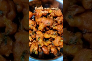 #CauliflowerPakodi #GobiPakora #PakodiRecipe #TeaTimeSnack #CrispyPakodi #gunaparvathiakkavlogs