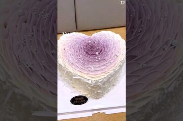 How to make a round cake into a heart with purple flower decorations #shorts #cakedecorating