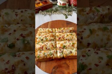 Cheesy Garlic Bread #garlic #bread #cheese #recipe #trending #cooking #tasty #baking #foodvideo #yum