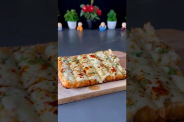Trending recipe of Cheesy Garlic bread #shorts #cheese #garlic #bread #shortvideo #baking