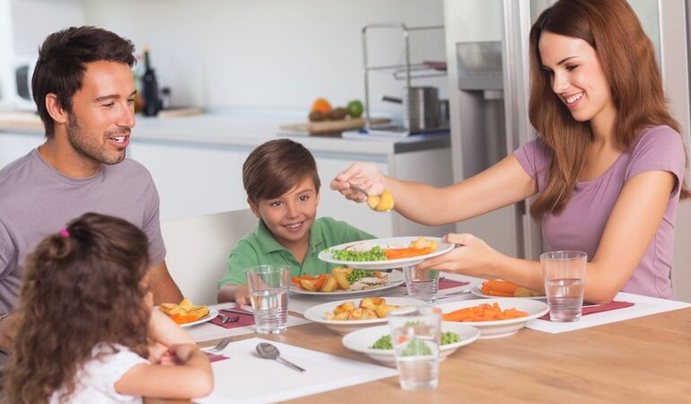 A family at the dinner table.