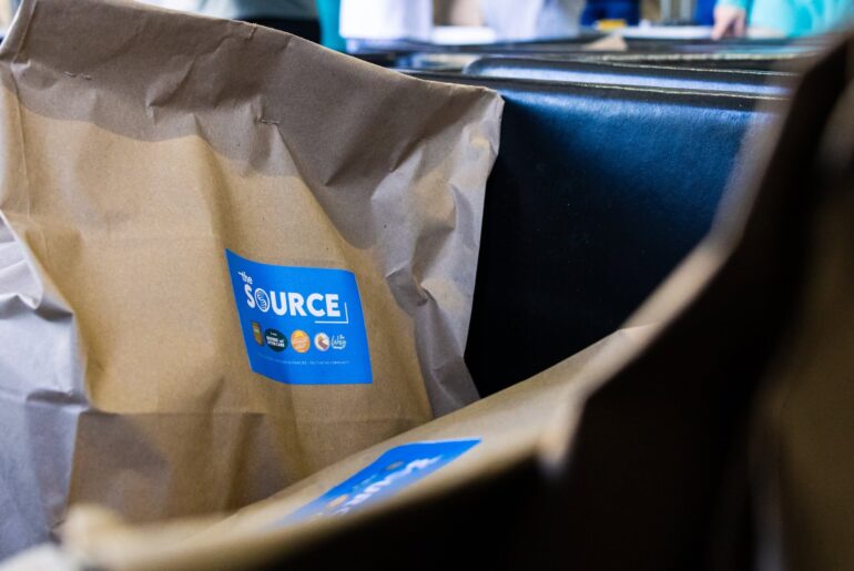 Energy utility taps into The Source with a six-figure gift honoring its effort to quell food insecurity