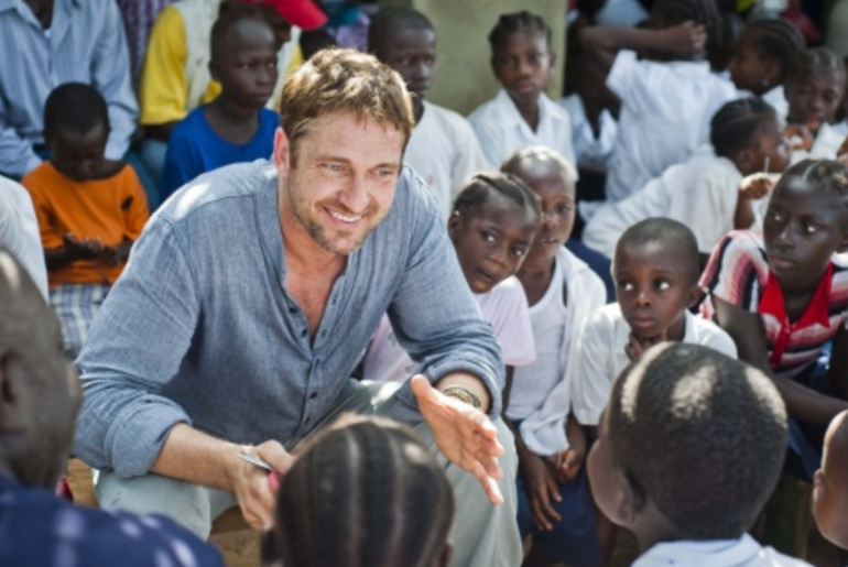 In 2013, Gerard Butler travelled to Liberia to serve school meals with a charity he supports; it has delivered more than 260 million meals since 2006 and now feeds over 95,000 children every school day